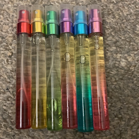 4 FOR $8 !!! Fresh baby powder scented spray on body oil. 💨 - Picture 4 of 4